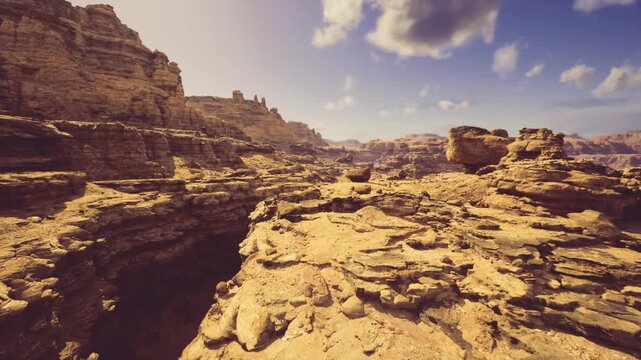 exposed strata sandstone layers reveal geological history with horizontal bedding pockets of erosion fractured surfaces and compacted sediments under clear sky