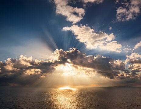 sun shining through clouds creating a beautiful and serene scene in the sky