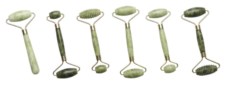 Set of six green jade facial rollers with gold hardware for skincare and massage, showing various stone textures and shades from light to dark green for beauty treatments