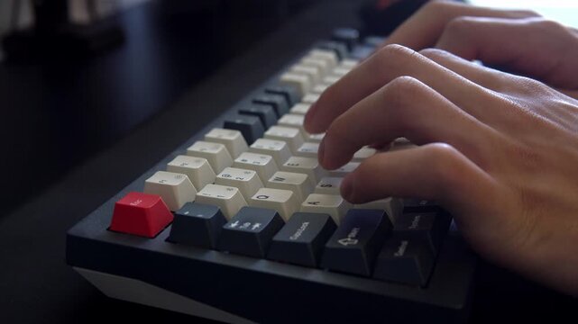 Close Up of Hands Typing on Keyboard