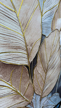 Elegant botanical leaf design with neutral beige, gray and brown tones, accented with metallic gold details and rich textured surface.