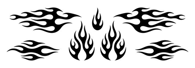 Fototapeta premium Flame Tattoo Designs: A collection of stylized flame graphics, perfect for custom tattoo designs or edgy graphic elements. These black silhouettes evoke power and intensity.