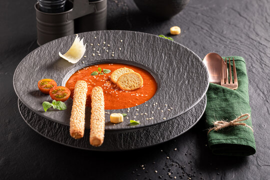 Exclusive and aromatic tomato soup as fine dish in restaurant.