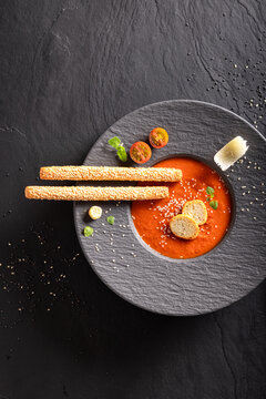 Professional tomato soup as culinary artistry in top kitchen.