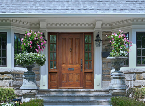 Elegant wood grain front door with sidelights