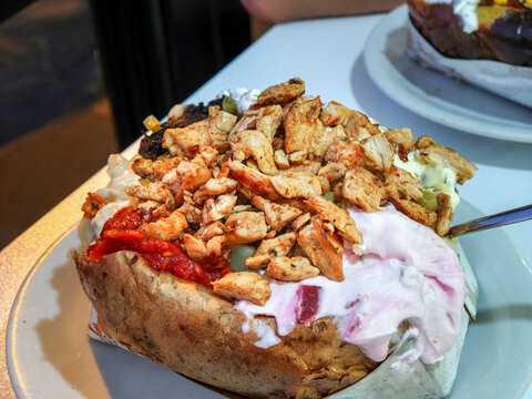Turkish Kumpir Baked Potato Stuffed with Chicken and Salad