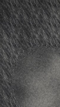 Thin Layer of Fine Grains Drifting Over a Flat Board with a Motionless Copy Space Zone, Seamless Loop in deep ink tones vertical 9:16