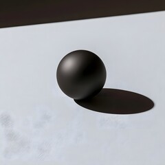Fototapeta premium Matte Black Geometric Sphere on Pale Grey Surface
