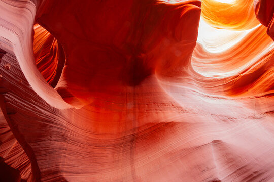 Swirling natural patterns formed by erosion over  millennia in Navajo Sandstone of Antelope slot canyons near Page