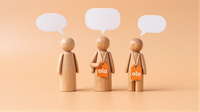 Three wooden figures with speech bubbles, one tagged 'olo', symbolizing communication or branding.