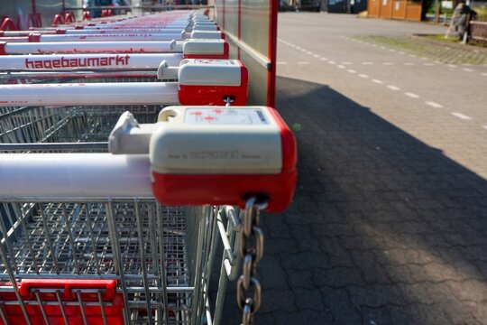 Kiel, Germany - 27. July 2026: Hagebaumarkt shopping carts lined up outside store