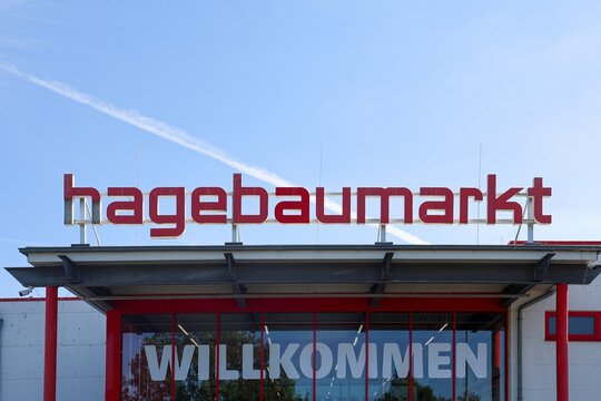 Kiel, Germany - 27. July 2026: Hagebaumarkt logo on building entrance welcoming customers
