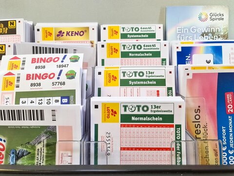 Kiel, Germany - 27. July 2026: Display rack showing German lottery and betting tickets