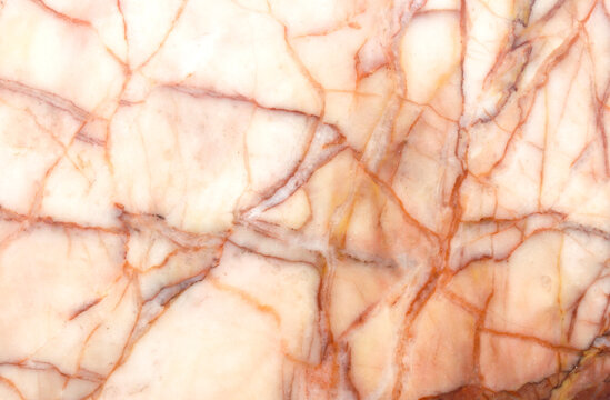 Red marble background surface.
