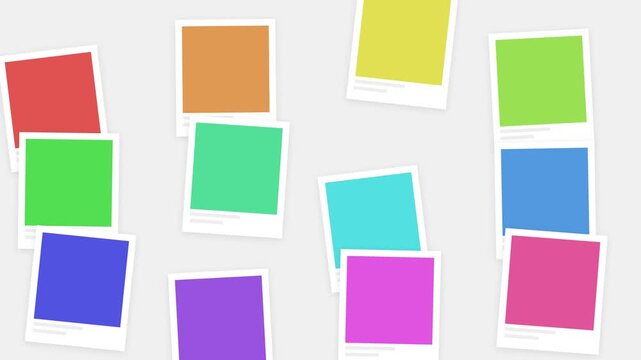 Staggered cascade of vibrant rainbow instant photo frames falling against a white backdrop