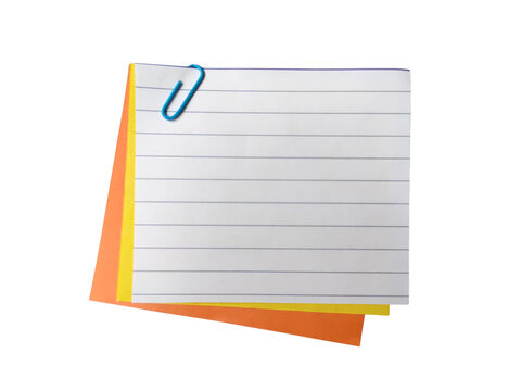 Colorful paper clip holding lined notebook pages