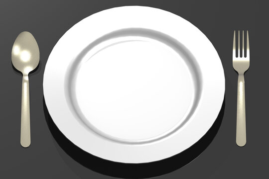 White plate and  spoon and fork. Food concept