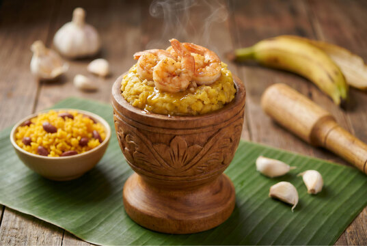 Puerto Rican Mofongo with Garlic Shrimp in a Wooden Pilon for Hispanic Heritage Month