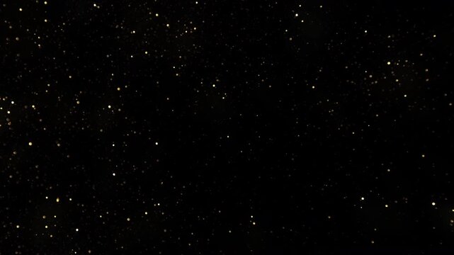 Super Slow Motion Shot of Glittering Golden Background at 1000fps.