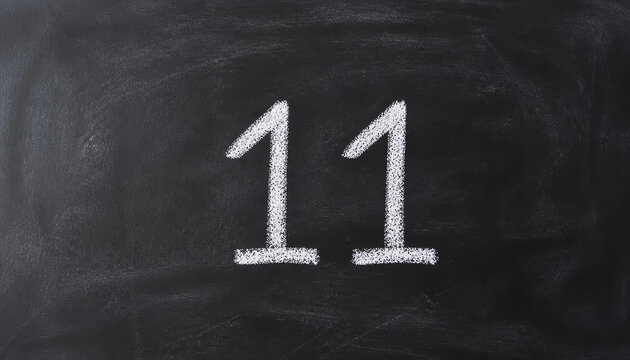 number eleven enumeration written with a chalk on the blackboard