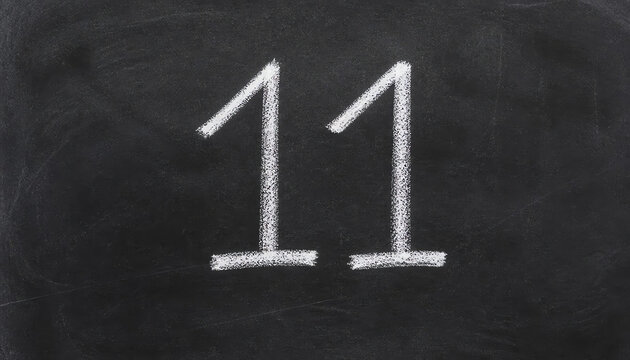 number eleven enumeration written with a chalk on the blackboard