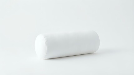 Obraz premium White cylindrical pillow or bolster cushion on neutral background, suitable for product mockups, interior design presentations, bedding catalogs, and home decor advertising.