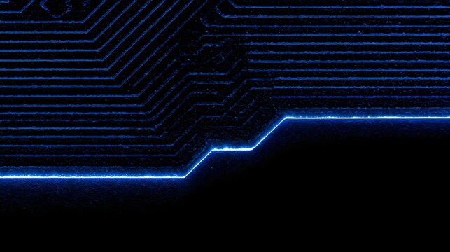 Macro shot of a neon blue circuit board trace