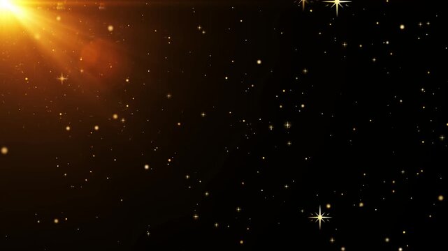 Golden light emanates from a corner to illuminate a field of sparkling particles in the darkness.