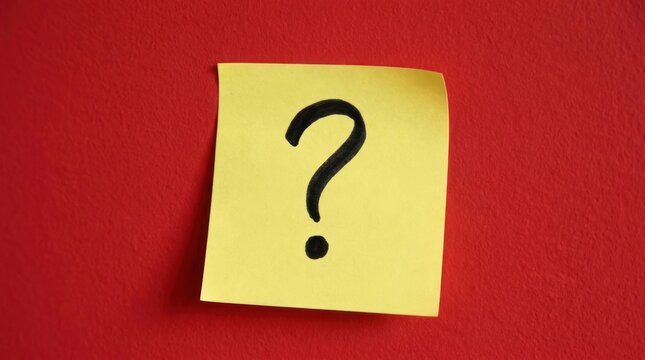 black question mark on sticky note over solid red background