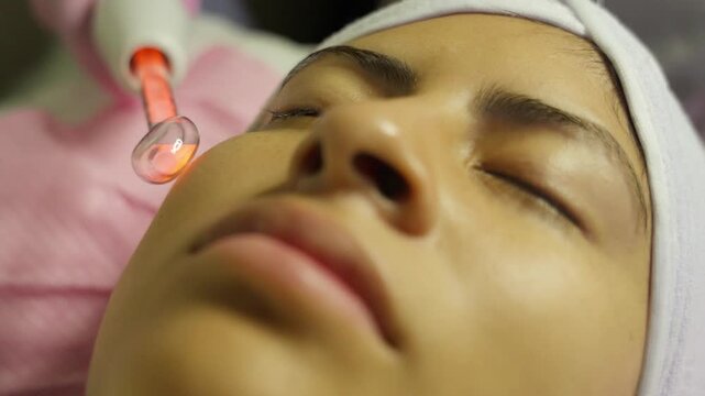 High frequency facial treatment for skin rejuvenation and acne