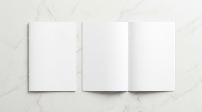 Blank white booklet mockup set featuring an open spread and closed cover on a clean white marble background, ideal for magazine, brochure, or catalog branding and print layout presentations.