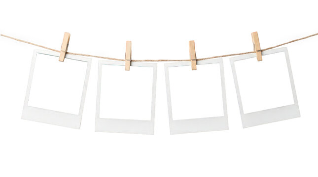 Vintage instant photo frames hanging on clothesline, blank polaroid style film prints with wooden clips, nostalgic memory gallery isolated on Transparent Background
