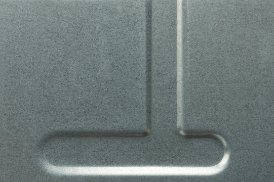 Metal surface with stamp shape