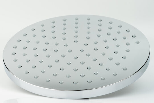 Shower head with circular design and dotted surface