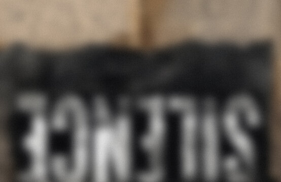 Blurry black sign with text