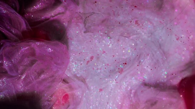 Shiny ink wave. Cloud mist. Blur purple red blue color paint sparkling bright texture glitter splash spreading on abstract art bokeh background.