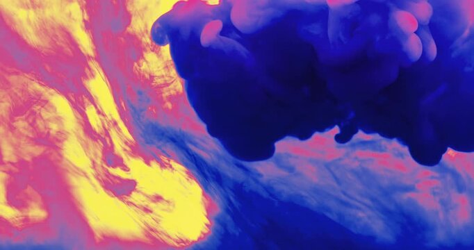 Vibrant blue, yellow, and magenta ink clouds bursting and blending dynamically in liquid. High contrast colorful paint fluid explosion, creative background, and abstract visual effect concept.