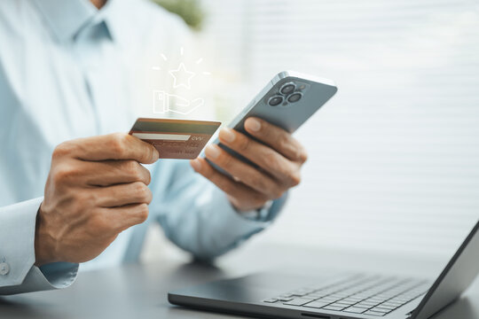 Customer redeeming loyalty points with a smartphone and credit card, highlighting digital rewards, cashback, membership benefits, and seamless mobile commerce.