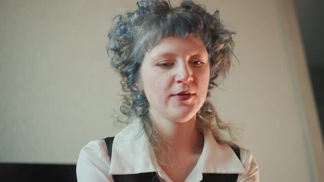 Caucasian fortune teller quietly reflecting, intimate headshot with subdued vintage tones, downward gaze, contemplative mood, hands folded and slow measured narration of future insight