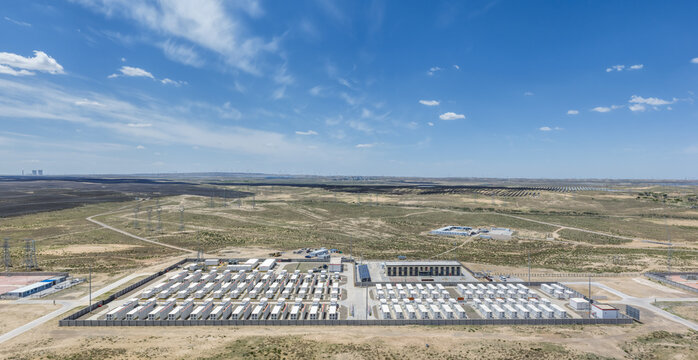 Aerial View of Battery Energy Storage Power Station with Solar Farms in Gobi Desert