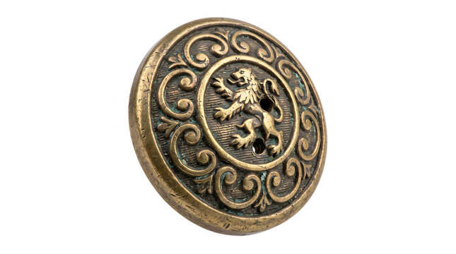 Antique brass button featuring embossed lion crest offers regal heraldic decoration.