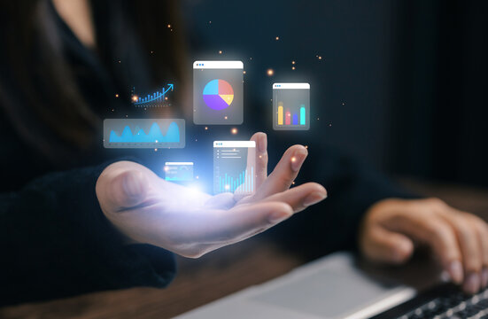 Businesswoman presenting digital analytics dashboard with interactive charts, business intelligence, data visualization, performance metrics and financial reporting for strategic decision making.