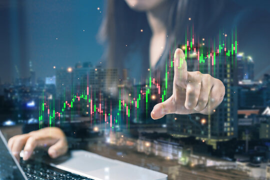 Businesswoman analyzes rising stock market candlestick chart over city skyline, illustrating investment growth, financial trading, market analysis, global economy, and business strategy.