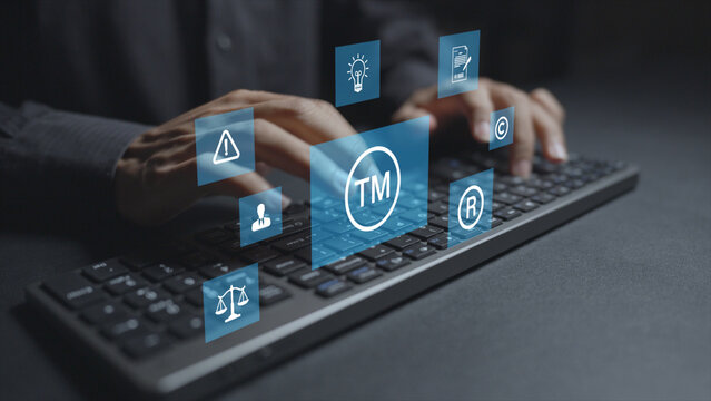 Trademark protection and legal compliance. Person typing keyboard with trademark registration and legal document icons, intellectual property protection, brand security and regulatory compliance.