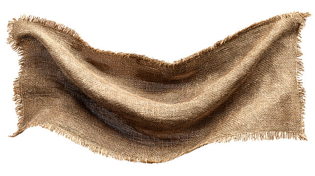 Folded brown burlap fabric with frayed edges on white background with folded piece thick thick rough material textile natural against fiber with weave