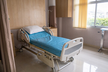 Hospital patient bed empty room ward window curtain medical care