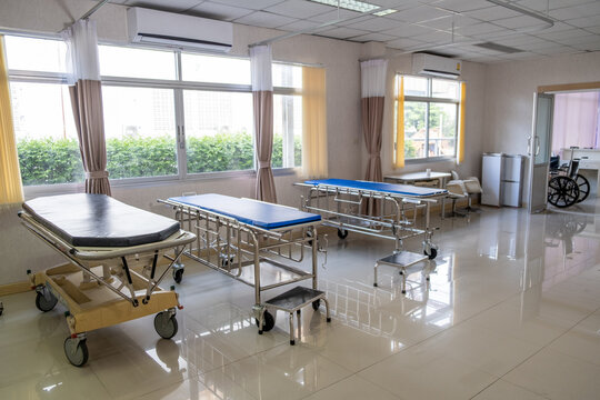 Hospital emergency room, stretcher bed, medical room, empty ward, clean interior, hospital equipment, hospital