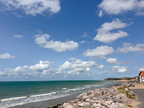 Scenic coastal view of the beach and seafront promenade in Wissant, France on the Opal Coast