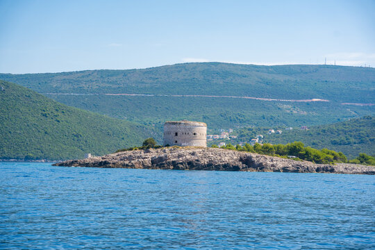 Historic Arza Fortress on the Lustica Peninsula in Montenegro on the Adriatic Sea. Military architecture overlooking the Bay of Kotor and protecting the coastal entrance.