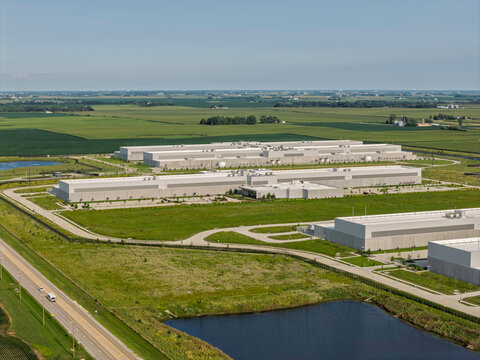 Aerial view of Meta data center facility in rural area with cooling units and surrounding industrial infrastructure, DeKalb, Illinois